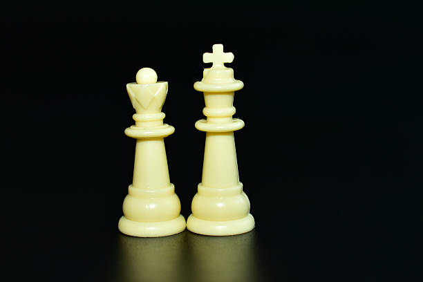 istock Chess pieces king and queen, white. 2223576123