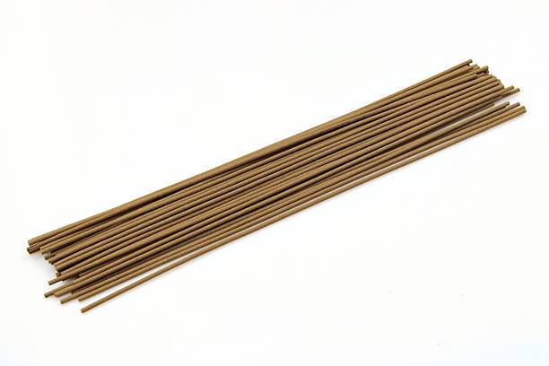 Wood Knitting Needle Cut Out on White.