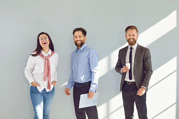 istock Happy cheerful positive business team having fun during a break at work in the office 2223588667