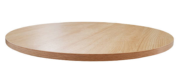 istock An empty circular wooden table for product display with a white background 2223590255