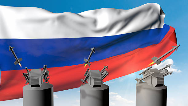 Anti-ballistic rockets launched from ground platforms in front of a proudly waving Russian flag. / You can see the animation movie of this image from my iStock video portfolio. Video number: 2223591535