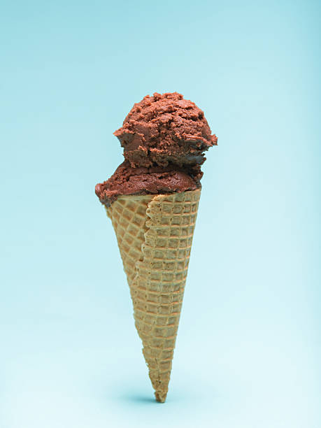 istock Chocolate Ice Cream Cone. Isolated on Blue Background. 2223592837
