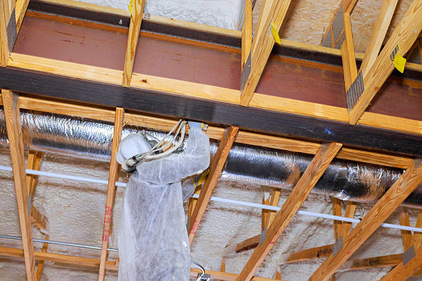 istock Contractor performs restoration work on ceiling beams in residential property during renovation project 2223593258