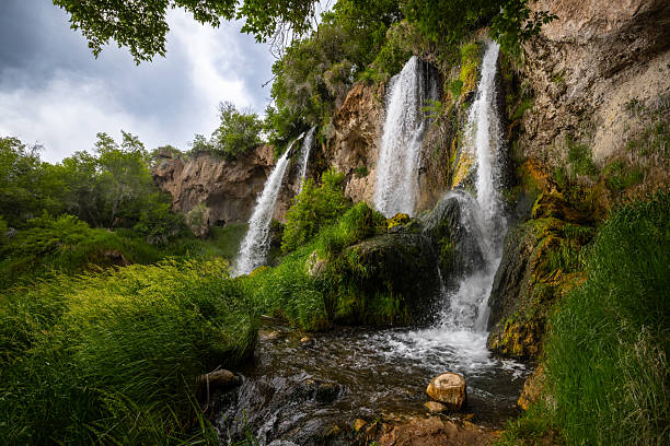 Multiple Waterfalls Blue Sky Green Tall Grass Wide Angle