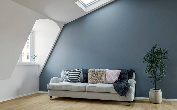 istock Bright Scandinavian Loft Interior with Roof windows (skylight), sloped ceiling, Cozy Sofa and Decorative Cushions 2223597078