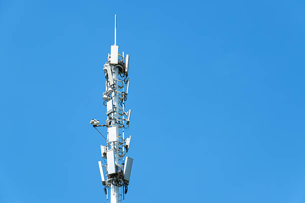 istock 5G telecommunications base station tower with sunny blue sky background 2223610028