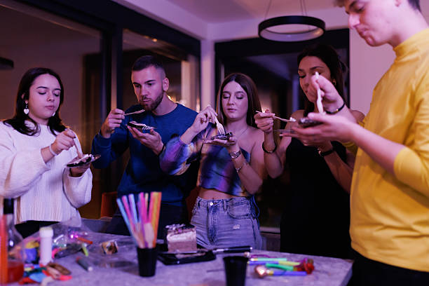 istock Young adults enjoying desserts and socializing during a fun gathering indoors 2223610478