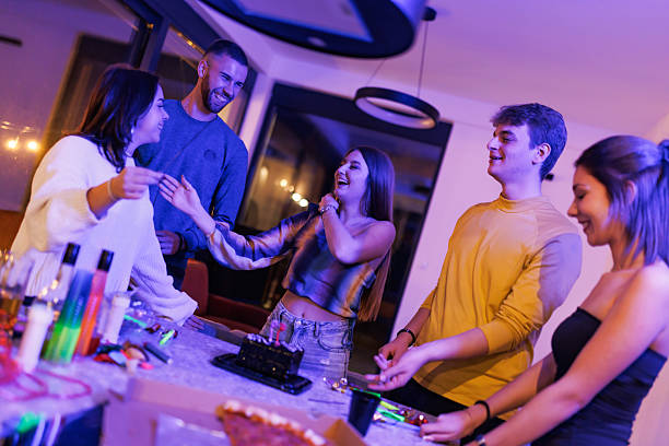Joyful gathering of friends celebrating together with fun and laughter indoors