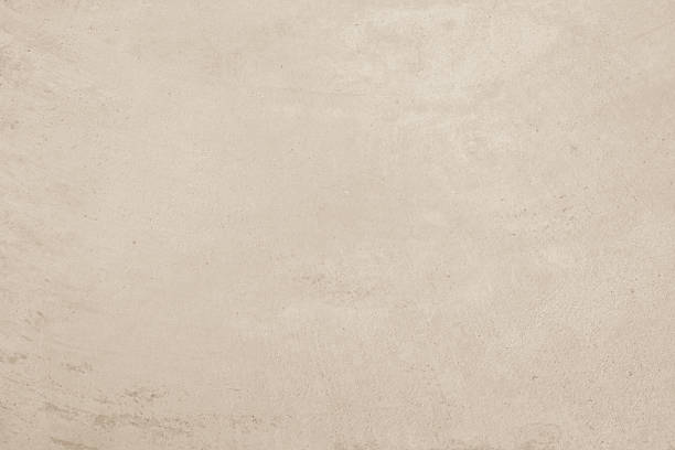istock Colour old concrete wall texture background. Close up retro plain cream color cement wall background texture. Design paper vintage parchment element. 2223610729