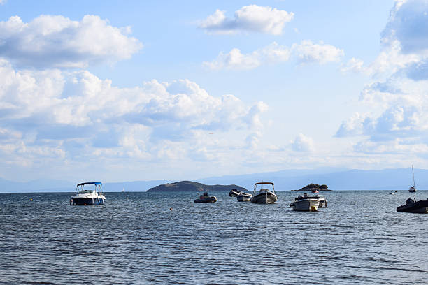istock Low flying plane coming into land over Skiathos island harbor 2223611764