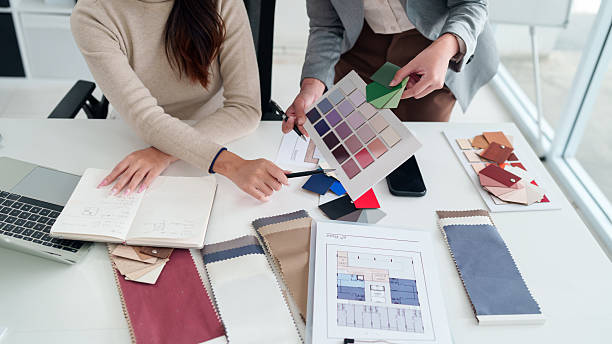 istock Interior Design Collaboration Asian Women with Color and Material Samples for Home Renovation Project Planning with Architect Team 2223614339