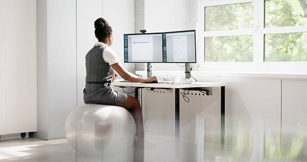 istock African American Woman Working On Exercise Ball 2223628230