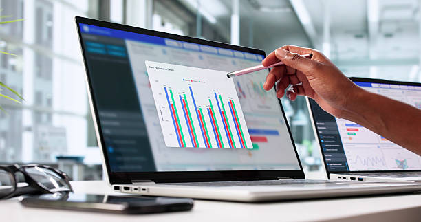 istock Real-Time Business Intelligence: African American Analyst Analyzes Emerging 2223628459