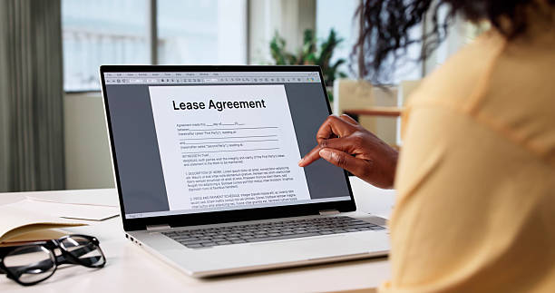 istock Woman Signing Lease Agreement 2223628665