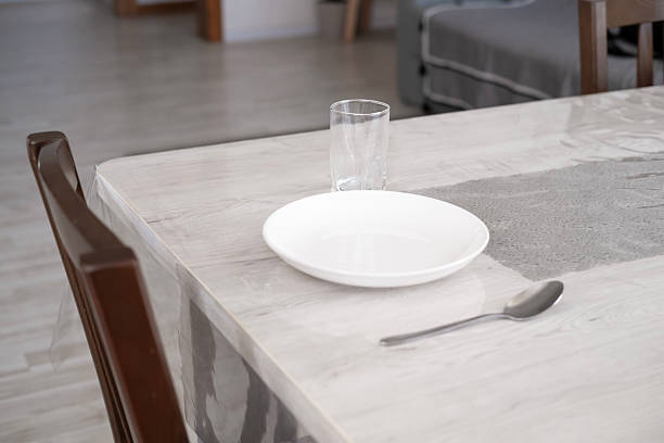 Serving a plate on the table at home.