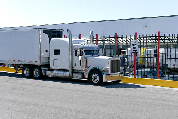 istock Classic American Truck Parked By Exit Sign After Unloading 2223629891