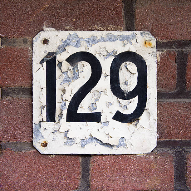 istock house number one hundred and twenty nine (129) 2223630433