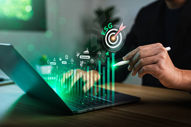 istock Businessman analyzing ESG data on digital interface with bar chart, environmental icons and corporate responsibility dashboard, promoting sustainable development, green investment, ethical governance 2223631059