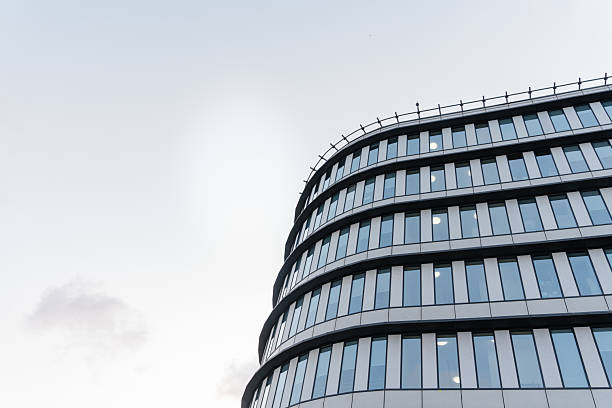 istock Beautiful modern building with glass against the sky 2223636575