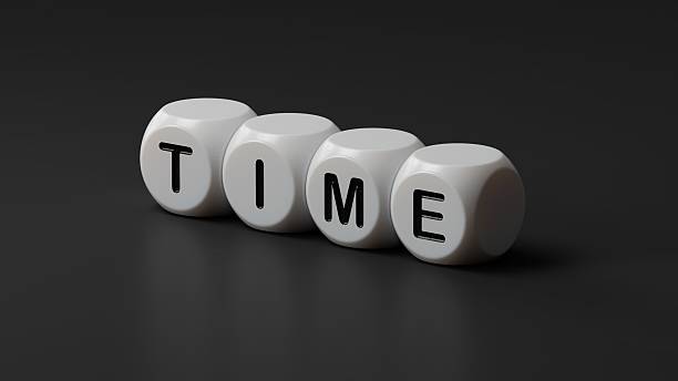 istock Time.wooden dice spelling.Flat lay view from above on  wooden dice buttons.IT technology concept.3D rendering on black background. 2223638924
