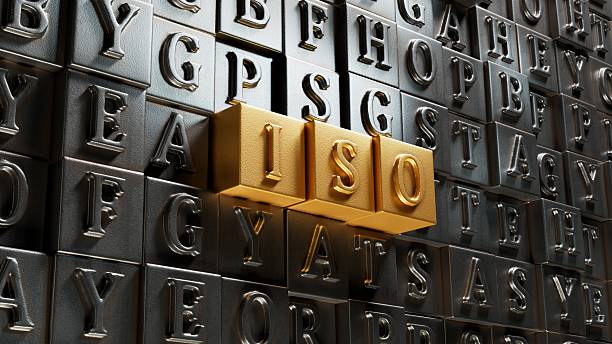 istock The abbreviation ISO on Movable type printing with check mark. ISO quality control certification approval concept.close up of Movable type printing.3D rendering on gold background. 2223638970