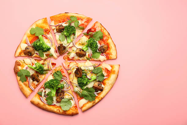 istock Delicious vegetarian pizza on pink table, top view. Space for text 2223640903