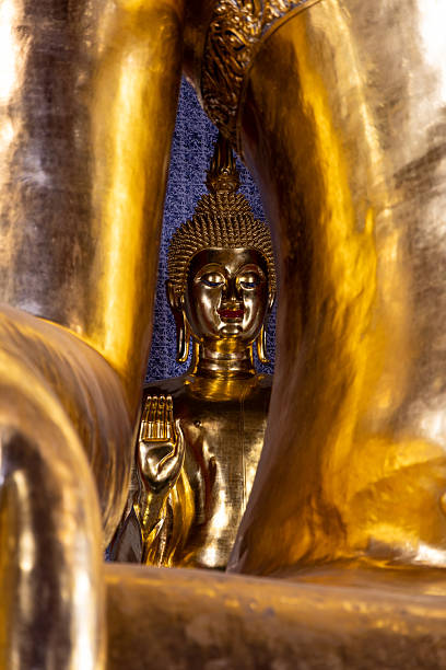 Hands of a golden Buddha statue in Thailand. Golden Buddha hand. Two hand of buddha statue.