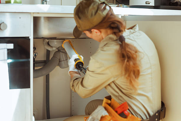 istock Plumber Caulking Sink Drain Pipes 2223645600