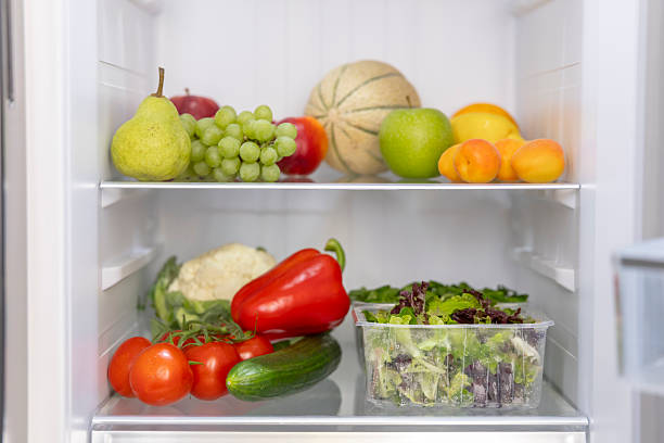 istock Fresh Fruits and Vegetables in a Refrigerator 2223645817