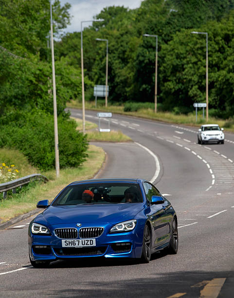 Milton Keynes,Bucks,UK - June 22nd 2025:  2017 blue BMW 640 m sport car driving on a British road