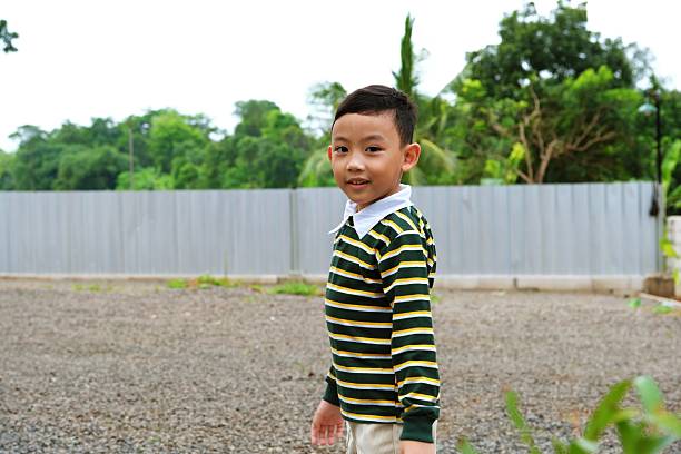 Cute Baby Boy with a Playful Expression. Happy and Playful Asian Baby Boy.