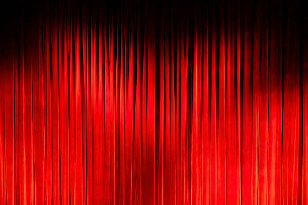 istock Dramatic Red Theater Curtains Creating Anticipation 2223652537