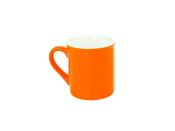 istock Side view, empty orange mug isolated on white background. Blank orange ceramic cup mockup and template for design, and banner. Use for home or restaurant 2223655927