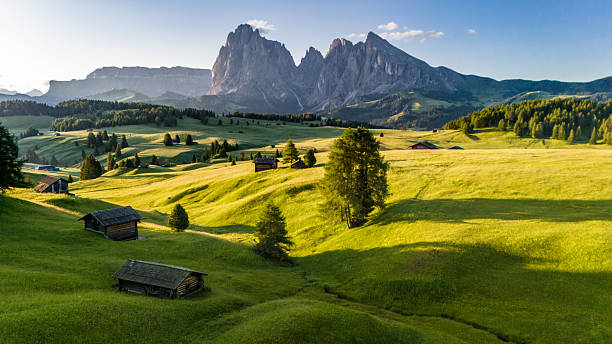 istock Alpe di Siusi at Dawn, Dolomites, Italy — Huts and Pastures 2223657766