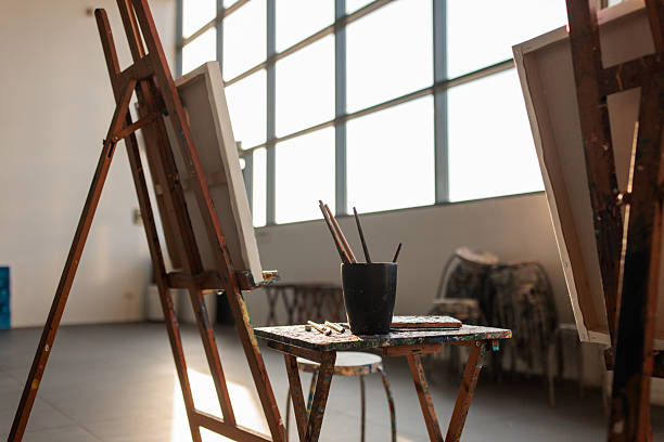 istock Sunlit Artist’s Studio with Traditional Wooden Easels 2223662446