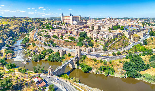 Aerial view of Toledo, a majestic Spanish city, with the Tagus River winding alongside