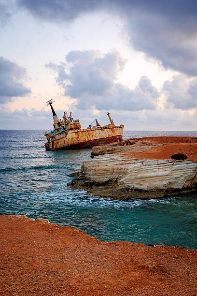 istock Rusty Shipwreck on Rocky Coast in Cyprus 2223668616