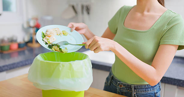 istock Asian Woman Food Waste kitchen 2223673272