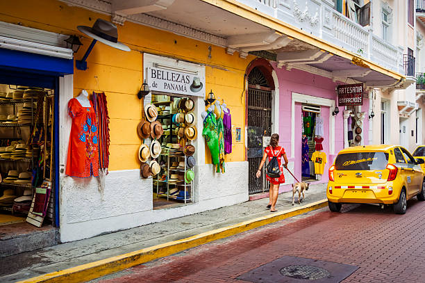 Panama City, Panama, May 16th, 2014: Walking Through Time: A Solitary Figure Beneath Spanish-Colonial Echoes