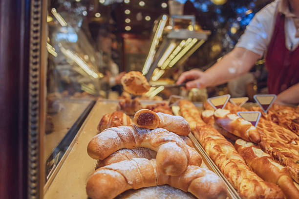 istock Freshly baked pastries displayed in a bustling bakery during morning hours 2223674079