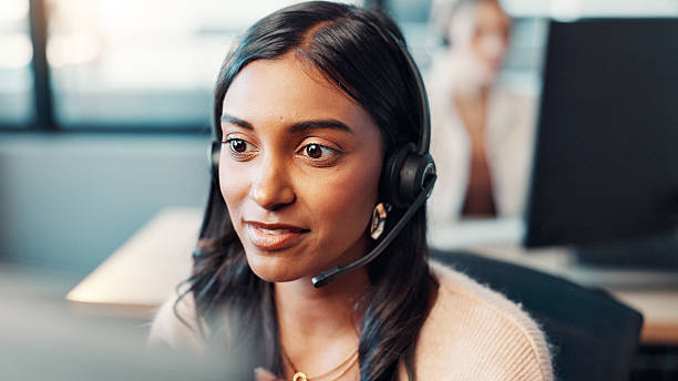 istock Computer, woman and talking with headset at call center for technical support, virtual assistance and help desk. Consultant, person and microphone for inbound query, customer service or online advice 2223675212