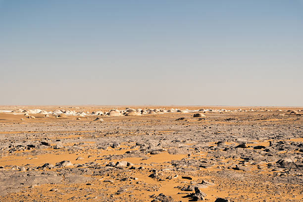 istock Ash-covered hills in Egypt's Black Desert under a clear sky, scenic and remote landscape. Volcanic mountains 2223678848