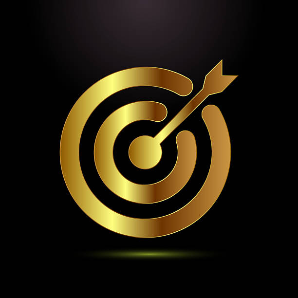 istock Golden target with arrow hitting the bullseye on a black background 2223678920