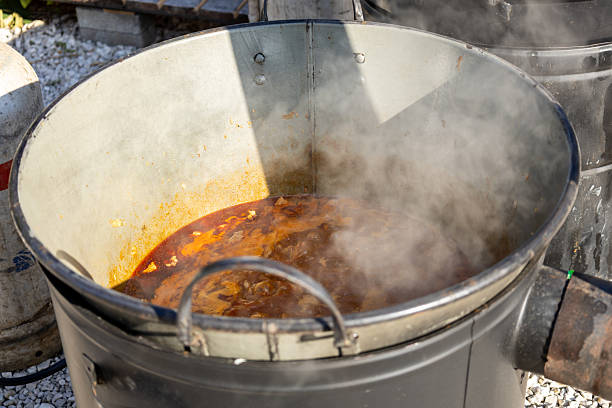 istock Traditional outdoor cooking in large cauldron 2223679610