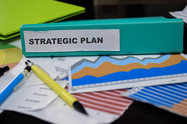 istock Folders with the label strategic plan. Business management concept 2223689060