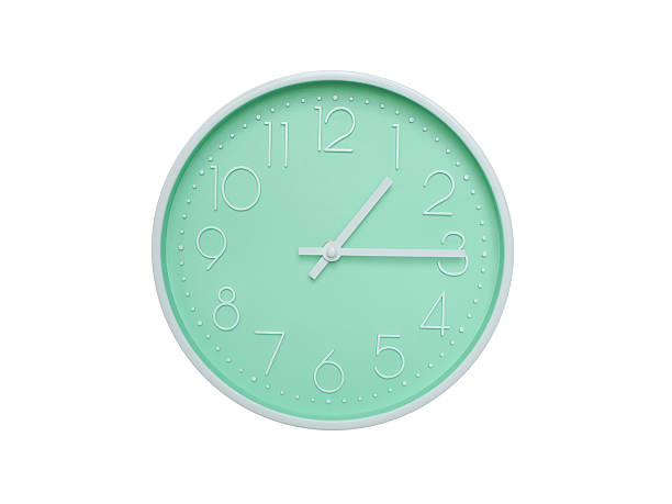 Modern mint green wall clock with white frame and numbers, showing 01:15 AM or 01:15. Ideal for minimalist designs, time-related content, or morning routine visuals.