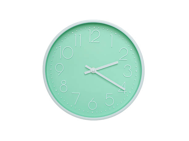Modern mint green wall clock with white frame and numbers, showing 02:20 AM or 02:20. Ideal for minimalist designs, time-related content, or morning routine visuals.