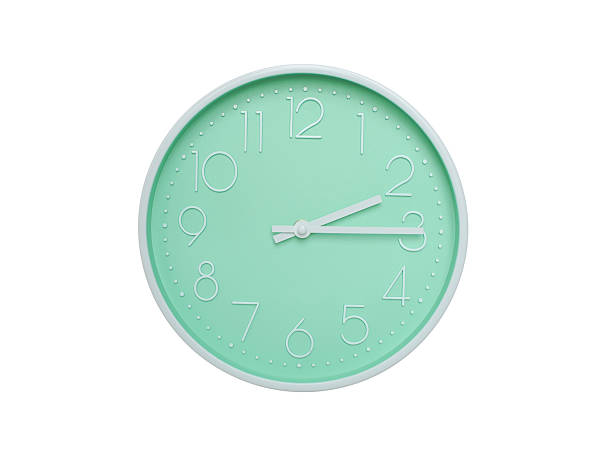 Modern mint green wall clock with white frame and numbers, showing 02:15 AM or 02:15. Ideal for minimalist designs, time-related content, or morning routine visuals.