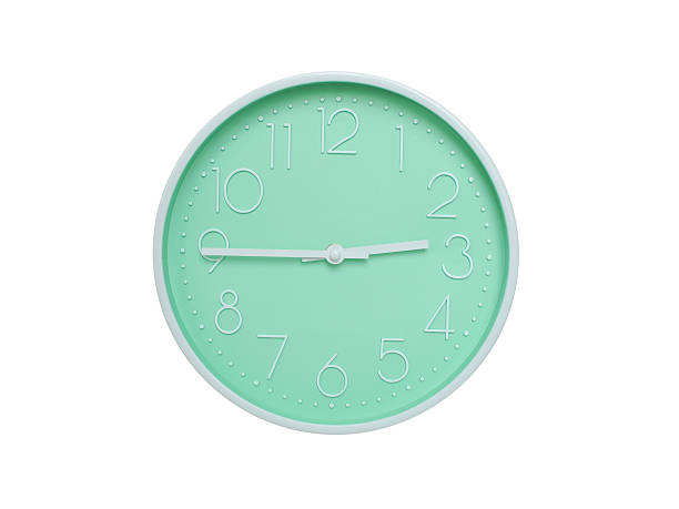 Modern mint green wall clock with white frame and numbers, showing 02:45 AM or 02:45. Ideal for minimalist designs, time-related content, or morning routine visuals.