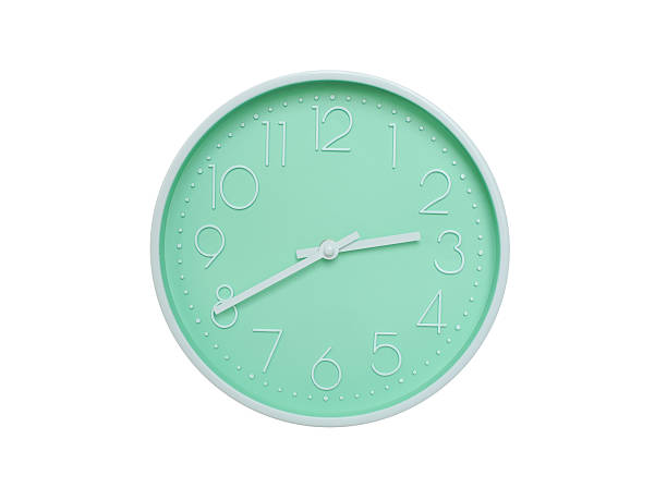Modern mint green wall clock with white frame and numbers, showing 02:40 AM or 02:40. Ideal for minimalist designs, time-related content, or morning routine visuals.